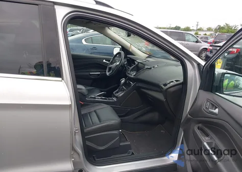 2014 Ford Escape Titanium z USA, uszkodzony, nr VIN 1FMCU9J99EUD98310